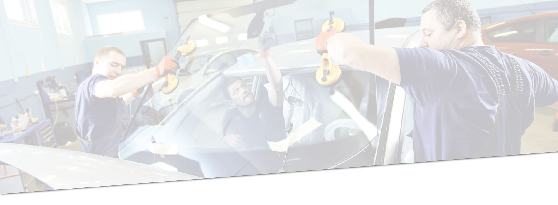 Dealer Auto Glass technicians installing a new windshield for a Phoenix customer